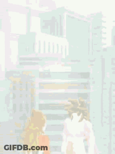 A Cartoon Character With A Red Tail Is Standing Next To Another Character With A Yellow Tail GIF