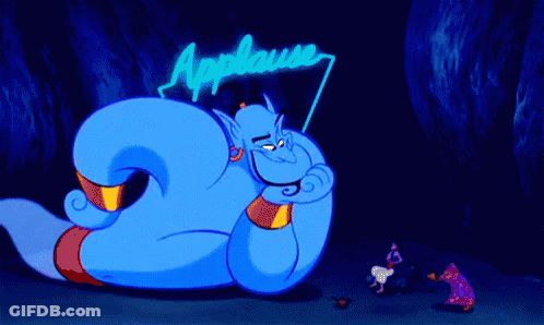 A Cartoon Character With A Sign That Says Applause Behind Him GIF