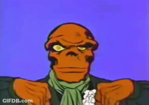 A Cartoon Character With A Skull On His Face Is Raising His Fist In The Air . GIF