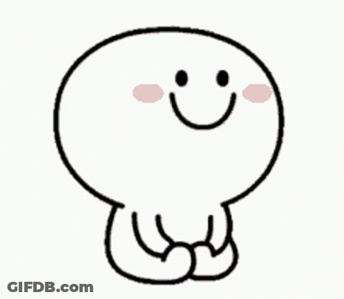 A Cartoon Character With A Smiley Face On His Face Is Sitting Down . GIF