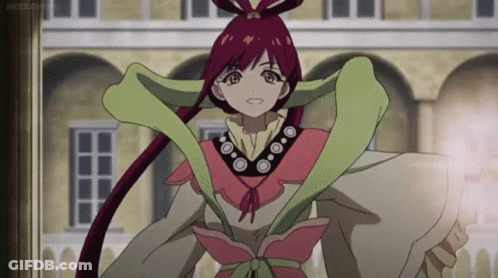 A Cartoon Character With A Snake Around Her Neck Is Standing In Front Of An Archway GIF