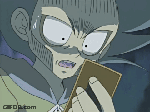 A Cartoon Character With A Surprised Look On His Face Holds A Card GIF