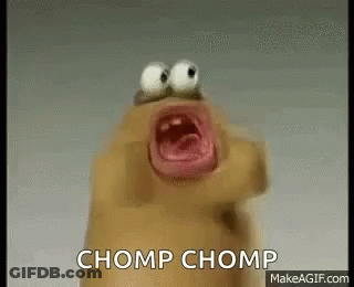 A Cartoon Character With Big Eyes Is Screaming With The Words Chomp Chomp Written On The Bottom . GIF