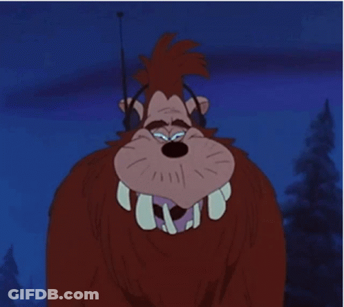 A Cartoon Character With Big Teeth And Headphones On GIF