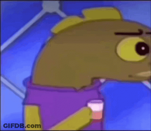 A Cartoon Character With Big Yellow Eyes Is Holding A Cup GIF