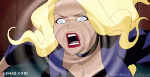 A Cartoon Character With Blonde Hair And Blue Eyes Is Screaming With Her Mouth Wide Open . GIF