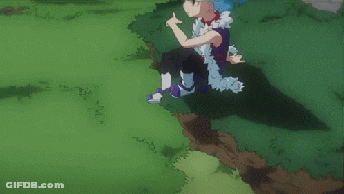 A Cartoon Character With Blue Hair Is Sitting In A Grassy Area GIF