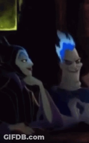 A Cartoon Character With Blue Hair Is Sitting Next To Another Cartoon Character And Making A Funny Face . GIF