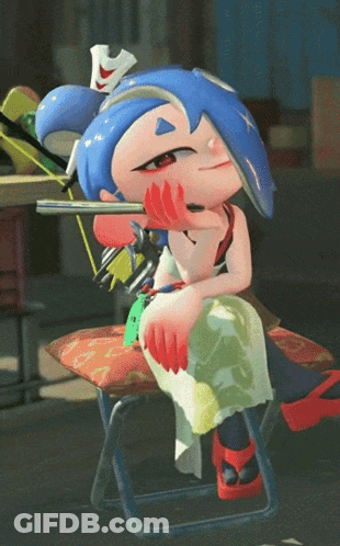 A Cartoon Character With Blue Hair Is Sitting On A Stool GIF