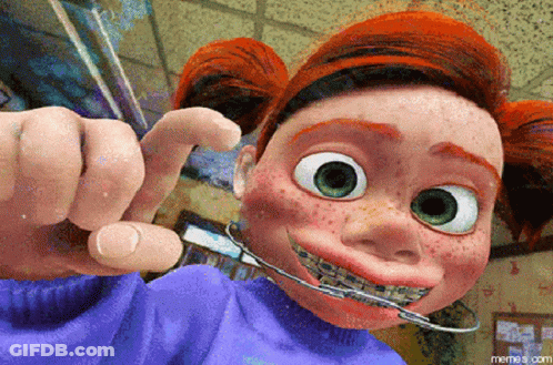 A Cartoon Character With Braces On Her Teeth Is Making A Face GIF