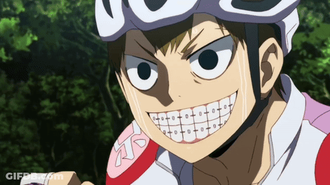 A Cartoon Character With Braces On His Teeth Is Wearing A White Helmet GIF