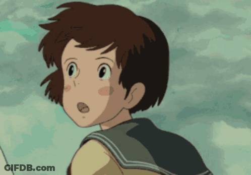 A Cartoon Character With Brown Hair And A Yellow Shirt GIF