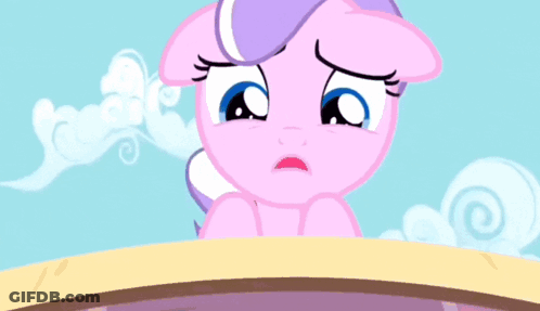 A Cartoon Character With Bubbles Around Her Eyes GIF