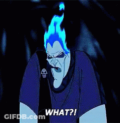 A Cartoon Character With Flames Coming Out Of His Mouth Says " What " GIF