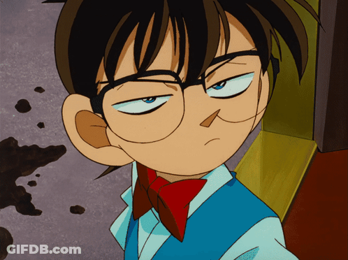 A Cartoon Character With Glasses And A Red Bow Tie Making A Funny Face GIF