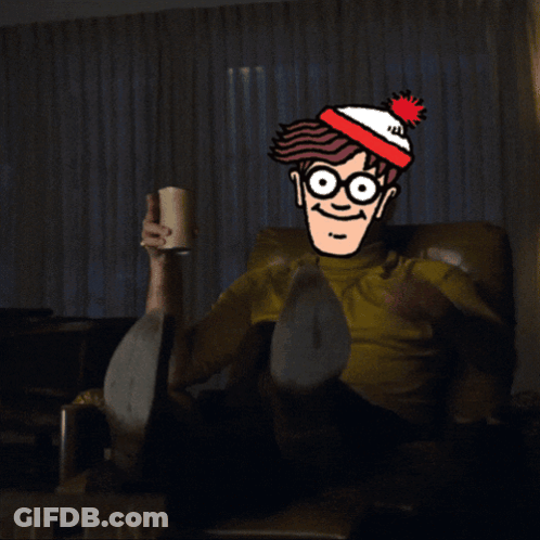 A Cartoon Character With Glasses And A Red White And Blue Hat Is Pointing At Something GIF