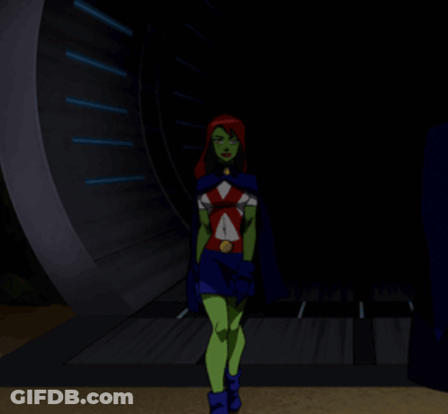 A Cartoon Character With Green Arms And Red Hair Stands With Her Arms Crossed GIF