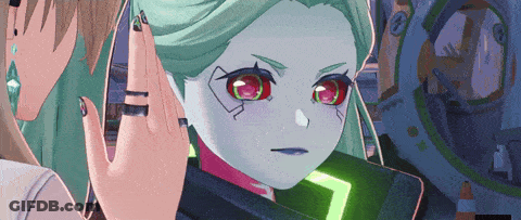 A Cartoon Character With Green Hair And Red Eyes Has The Number 7 On Her Face GIF
