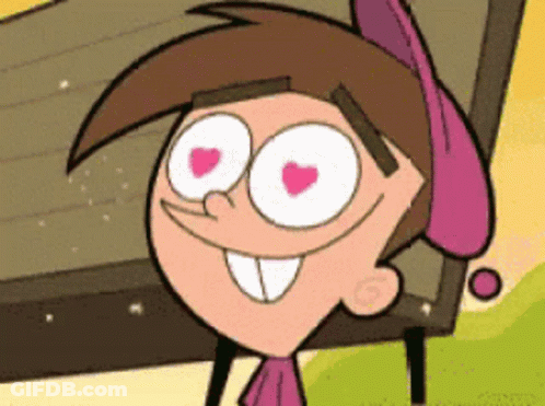 A Cartoon Character With Heart Shaped Eyes Is Smiling . GIF
