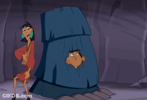 A Cartoon Character With His Arms Outstretched Is Standing In A Cave GIF