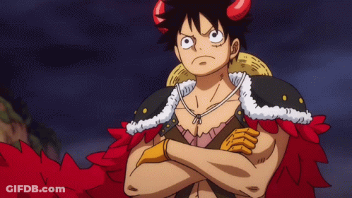 A Cartoon Character With Horns And A Straw Hat Stands With His Arms Crossed GIF