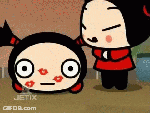 A Cartoon Character With Kisses On Her Face Is Standing Next To Another Cartoon Character With Kisses On Her Face . GIF