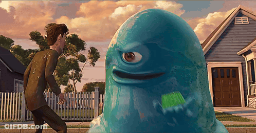 A Cartoon Character With One Eye Is Standing Next To A Man In Front Of A House GIF