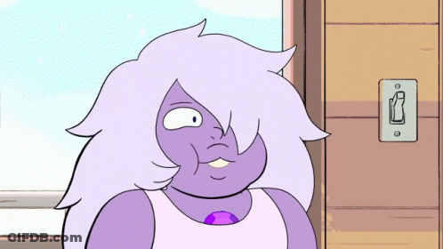 A Cartoon Character With Purple Hair And A Purple Stone GIF