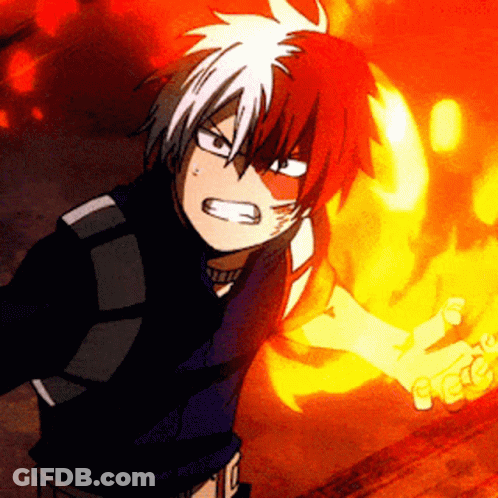 A Cartoon Character With Red And White Hair Is Holding A Fireball In His Hand GIF