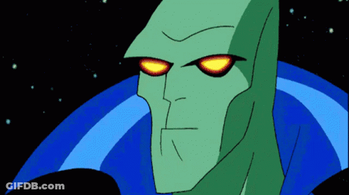 A Cartoon Character With Red Eyes And A Blue Cape Looks At The Camera GIF