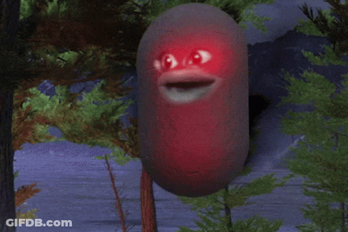 A Cartoon Character With Red Eyes And A Smile On Its Face GIF