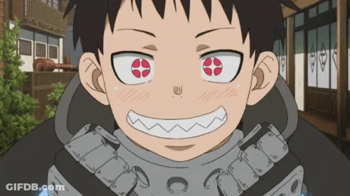 A Cartoon Character With Red Eyes And A Smiley Face GIF