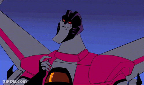 A Cartoon Character With Red Eyes And A White Smile GIF