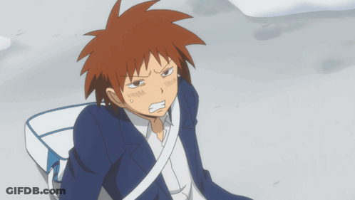 A Cartoon Character With Red Hair And A Blue Suit GIF
