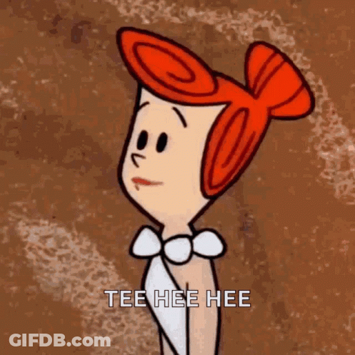 A Cartoon Character With Red Hair And A Bow Tie Is Standing In Front Of A Brown Background And Says Tee Hee Hee . GIF