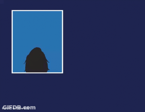 A Cartoon Character With Red Hair And A Santa Hat GIF