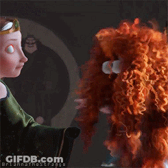 A Cartoon Character With Red Hair And Big Eyes Is Standing Next To Another Cartoon Character GIF