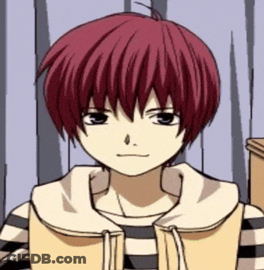 A Cartoon Character With Red Hair And Black Eyes GIF