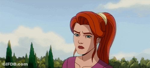 A Cartoon Character With Red Hair And Blue Eyes GIF