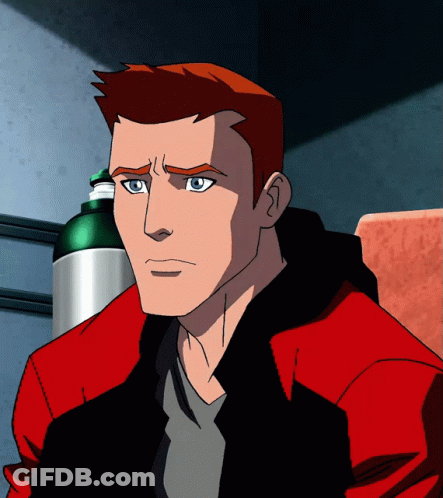 A Cartoon Character With Red Hair And Blue Eyes Is Sitting In A Chair GIF