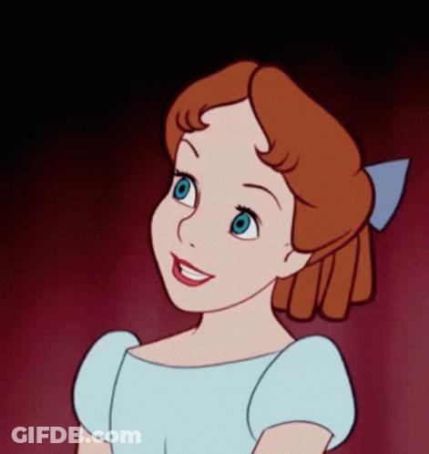 A Cartoon Character With Red Hair And Blue Eyes GIF