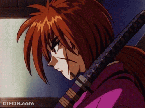 A Cartoon Character With Red Hair Is Holding A Sword In His Right Hand GIF