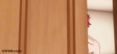 A Cartoon Character With Red Hair Is Standing In Front Of A Picture Of Himself Surrounded By Stars . GIF