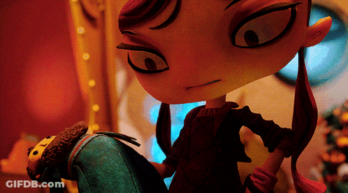 A Cartoon Character With Red Hair Is Standing Next To A Stuffed Toy GIF