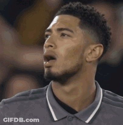 A Cartoon Character With Smiley Faces Around It GIF