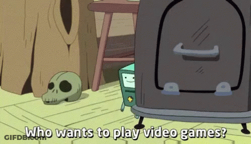 A Cartoon Character With The Words Who Wants To Play Video Games GIF