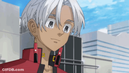 A Cartoon Character With White Hair And A Red Jacket Looks At The Camera GIF