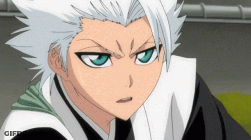 A Cartoon Character With White Hair And Blue Eyes Has A Serious Look On His Face GIF