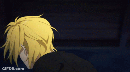 A Cartoon Character With Yellow Hair And A Black Jacket GIF