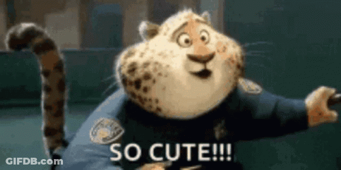 A Cartoon Cheetah From Zootopia Is Saying `` So Cute !!! '' . GIF